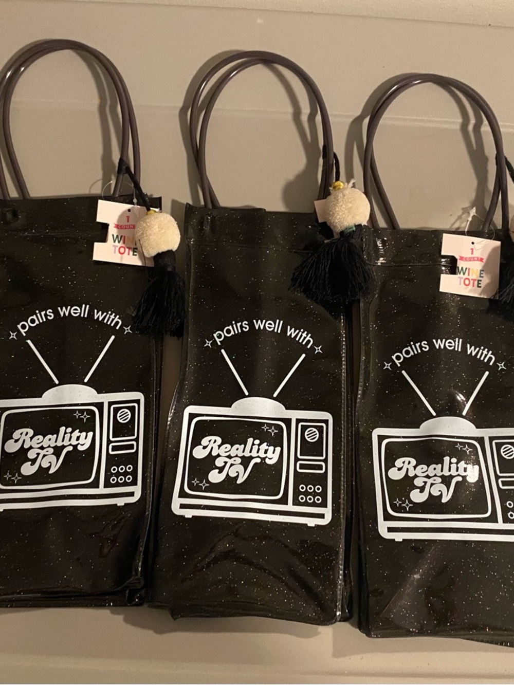 Reality TV Black Vinyl Wine Tote with Tassel Charm